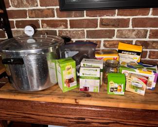 Lef to Right: Presto Pressure Canner & Cooker. $50. Vintage galvanized steel oval wash tub. $20. Vintage Ball & Bi-Lo Canning Jar storage caps. $5. Aluminum pie pans. $5