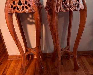Pair of vintage Asian-style hand-carved wood plant stands or pedestal urn tables with inset mauve marble tops. Approx. 37h x 16w. $125 for the pair.