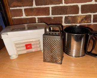 Paderborn World Cuisine 4-Blade Folding Vegetable Slicer/Spiralizer with storage base. $10. Vintage grader $5. Sifter $8.