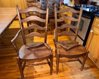 Solid hard maple wood, Martin's hand-crafted shaker style kitchen table with 4 leaves & 10 captain's ladder-back chairs with traditional turned legs. (2 chairs need repair.) Very sturdy and in very good condition. Approx. 109 x 42" with all 12" leaves. $1500