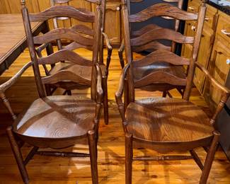 Solid hard maple wood, Martin's hand-crafted shaker style kitchen table with 4 leaves & 10 captain's ladder-back chairs with traditional turned legs. (2 chairs need repair.) Very sturdy and in very good condition. Approx. 109 x 42" with all 12" leaves. $1500