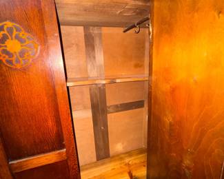 Inside pic of the Antique Edwardian or Art Nouveau style mirrored wardrobe likely dating from the 1910's-1920's. Quarter-sawn oak or tiger oak, beveled mirror door. Known as a "knock-down" wardrobe. Approx. 36 1/2 w x 83h x 15 1/2 d.  $350