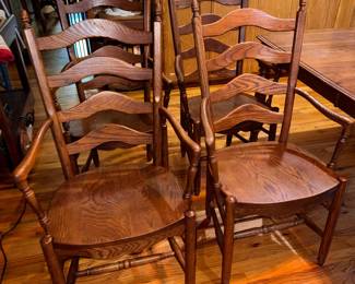 Solid hard maple wood, Martin's hand-crafted shaker style kitchen table with 4 leaves & 10 captain's ladder-back chairs with traditional turned legs. (2 chairs need repair.) Very sturdy and in very good condition. Approx. 109 x 42" with all 12" leaves. $1500