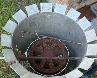 Outdoor propane jet burner and wind shield.