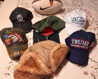 Signed football, baseball caps, misc. hats
