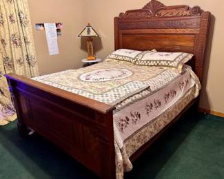 Antique 3/4 Size Eastlake style solid walnut or cherry wood bed with high-relief wood panels. Victorian era (approx. 1870-1890) $450. LAMP AND TABLE IN PIC NOT FOR SALE. 