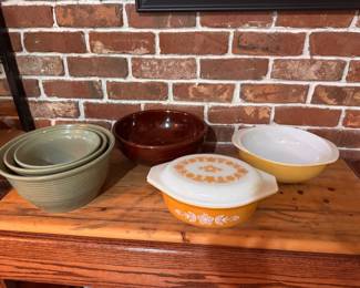 From Left to Right: Vintage Bauer Pottery "Ringware" Olive Green Nesting Bowls. Sold as set of 3. Large bowl has one chip. $45. Brown Ceramic Mixing Bowl. $15. Vintage Pyrex "Butterfly Gold" Oval 1.5 Quart Lidded Casserole. $30. Gold Oval Glass Casserole Base. $10.