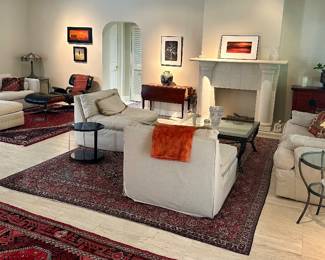 The large rug on the right is sold.