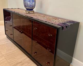 The blue glass urn is sold.