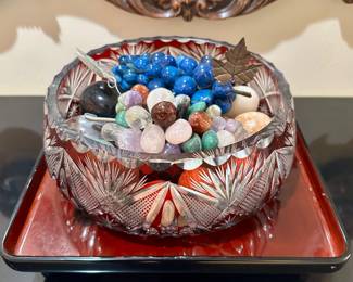 The lacquered tray and blue grapes are sold.
