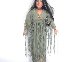 Lot #68 - Vintage Ltd. Edition "Timeless" Native American Porcelain Doll with Fringed Green Dress and Beaded Necklace