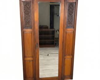 Lot #154 - Antique Wooden Wardrobe Armoire with Ornate Carved Floral and Mythical Face Details and Central Mirror