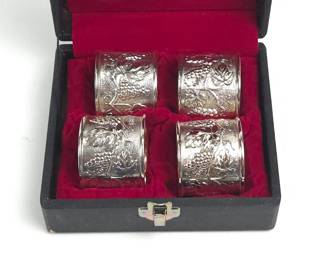 Lot #53 - Vintage Silver-Toned Napkin Rings with Grape and Leaf Embossed Design in Presentation Box