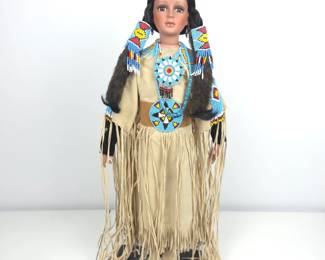 Lot #70 - Vintage "Timeless" Native American Doll with Beaded Accessories and Leather Fringe Dress
