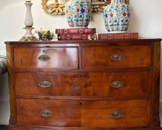 English bow front chest, carved gold leaf mirror 