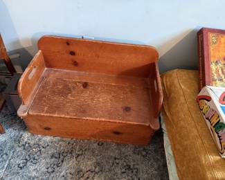 Antique child's wooden storage bench.