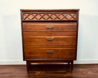 This is a vintage mid-century modern 4-drawer highboy dresser from the Bassett Furniture Tavern Collection