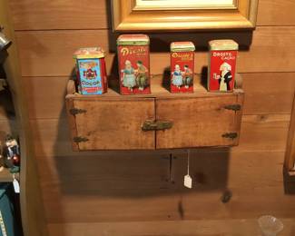 114. Huge collection of miniature cocoa tins