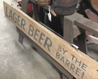 220.  Lager beer by the barrel sign