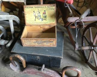 44. Lots of wooden advertising boxes.