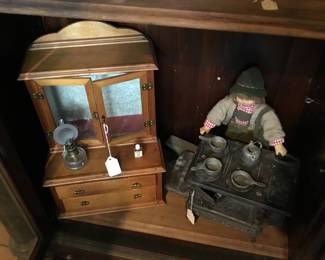295.  Miniature stove and cabinet