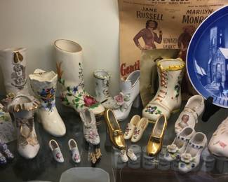 128.   Collection of ceramic shoes