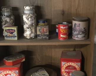 238.  We have a huge collection of miniature tins