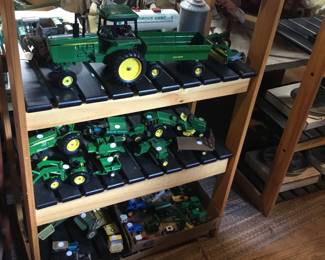 104.  John Deere toy vehicles 