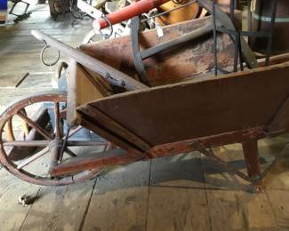 25.  We have several antique wheelbarrows and many farm tools 