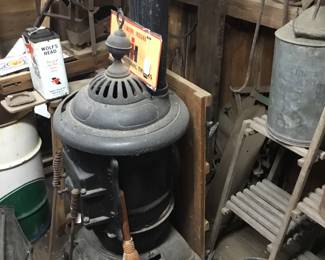 84.  Cast-iron stove and tools