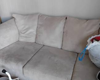 There is 2 sofas and 1 futo
