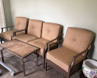 Love seat, two arm chairs, matching coffee table. This set has never been outside, only in the sunroom 