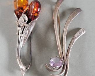199 Lot 368 Sterling silver and amber and sterling silver and amethyst brooches