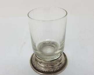 Lot 359 Antique whiskey tumbler sitting in a gadrooned
