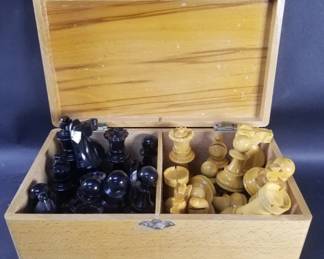 Lot 22 Lacquered wood Staunton chess set stored inside a