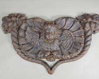 Lot 157 Vintage cast iron cherub plaque