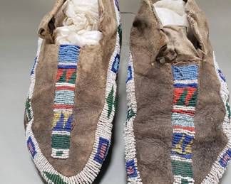Lot 579 Pair of antique handmade beaded moccasins