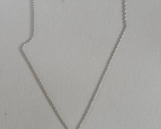 036 Lot 618 14k white gold chain with moissanite journey pendant