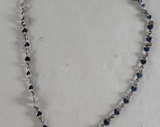 Lot 495 Silver necklace with interlinked blue enamel