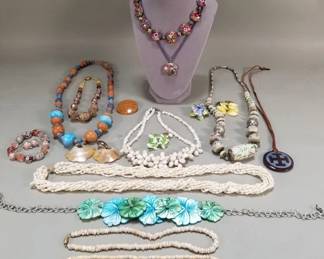 Lot 111 Group of colorful costume jewelry, shell, seed