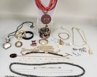 Lot 597 Group of vintage costume jewelry, necklaces,