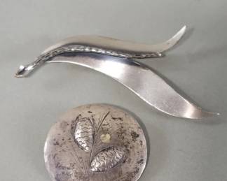 Lot 211 Pair of sterling silver brooches