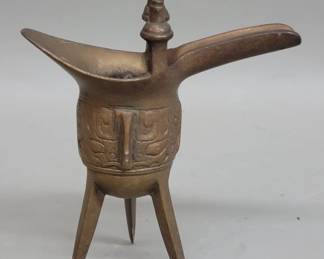 Lot 546 Vintage Chinese brass jue tripod wine vessel