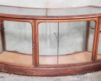 066 Lot 101 Antique walnut display cabinet with beveled glass