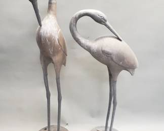 Lot 129 Pair of brass garden cranes