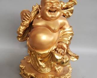 Lot 406 Gilt composite Buddha statue