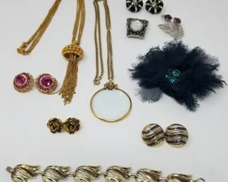 Lot 626 Group of vintage designer costume jewelry,