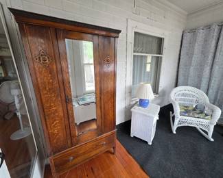 Antique Wardrobe and white wicker furniture