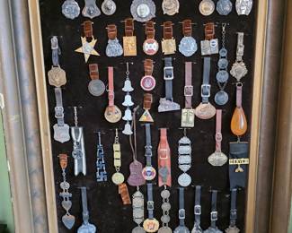 Wonderful framed collection of 1900's Fobs