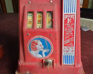 1920's Ginger Cigarette Slot Machine in working condition.